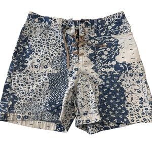 Gloria Vanderbilt Jean shorts with tie front and button closure. Floral pattern.